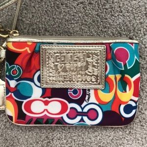 Fun, colorful Coach wristlet.